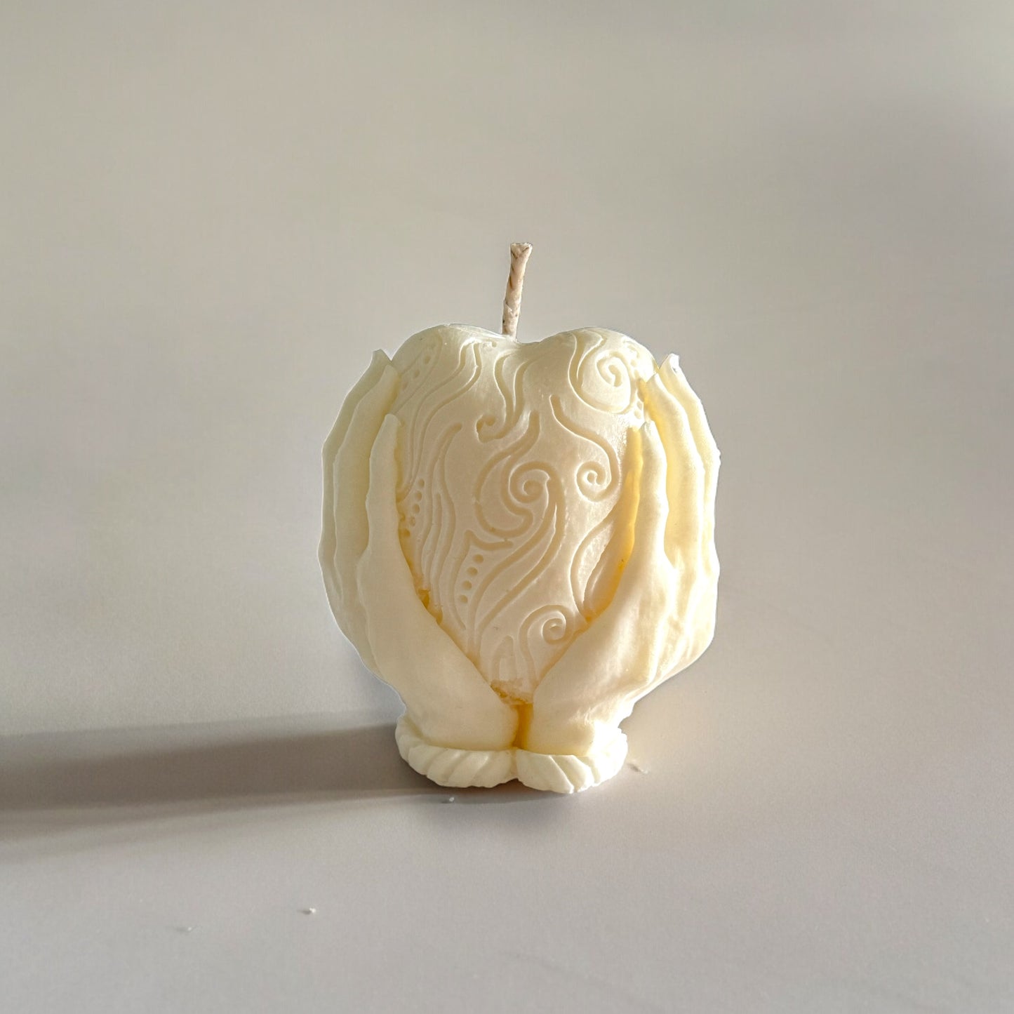 Holding Heart Candle