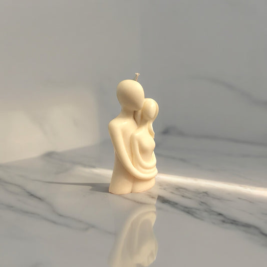 Embracing couple candle